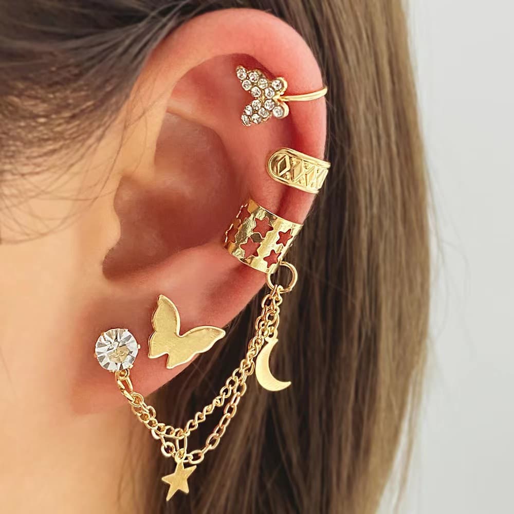 European and American four-piece set with rhinestone butterfly hollow non-perforated cartilage earrings fashionable star and moon integrated chain ear clips 1