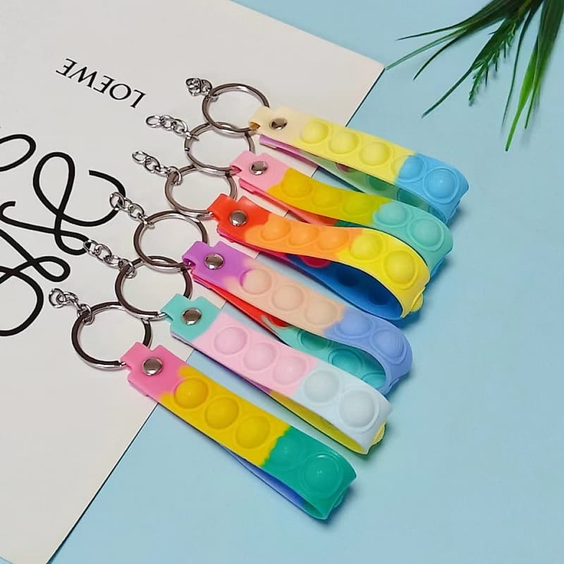 6014# Hot Selling Trendy Colorful Stress Reducing Bubble Keychain Leather Cord PVC Soft Wristband Keychain Accessories 1