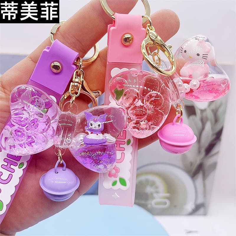 New oil-filled floating cartoon bell, quicksand bow keychain, personalized trendy bag pendant, car pendant 2