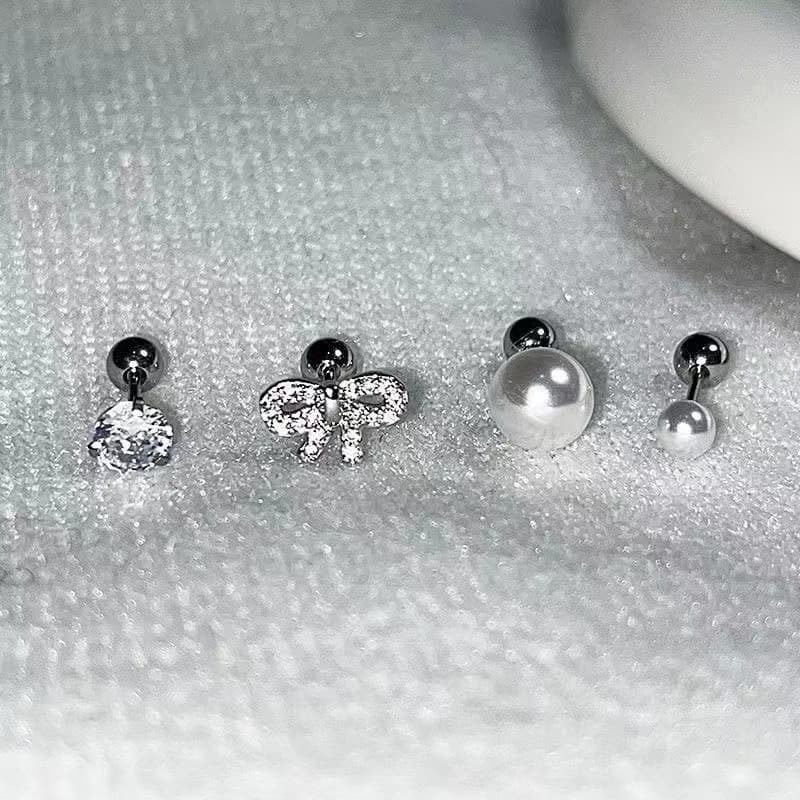 Super sweet soft girl ear bone nail set bow pearl titanium steel screw screw cochlear nail sweet cool ear nail hot girl earrings
