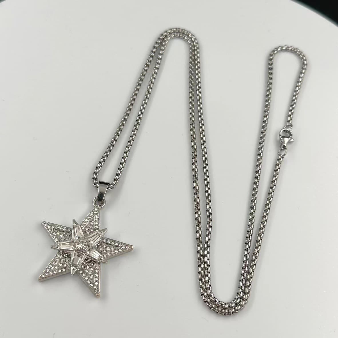 New rotating five-pointed star necklace full of diamond alloy pendant European and American street fashion personality popular jewelry sweater chain 3