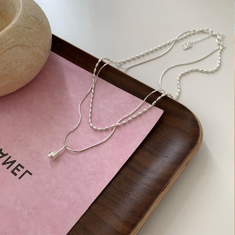 Cold style double layer water drop pendant necklace wholesale light luxury simple high-end stacked rice grain clavicle chain jewelry for women 5