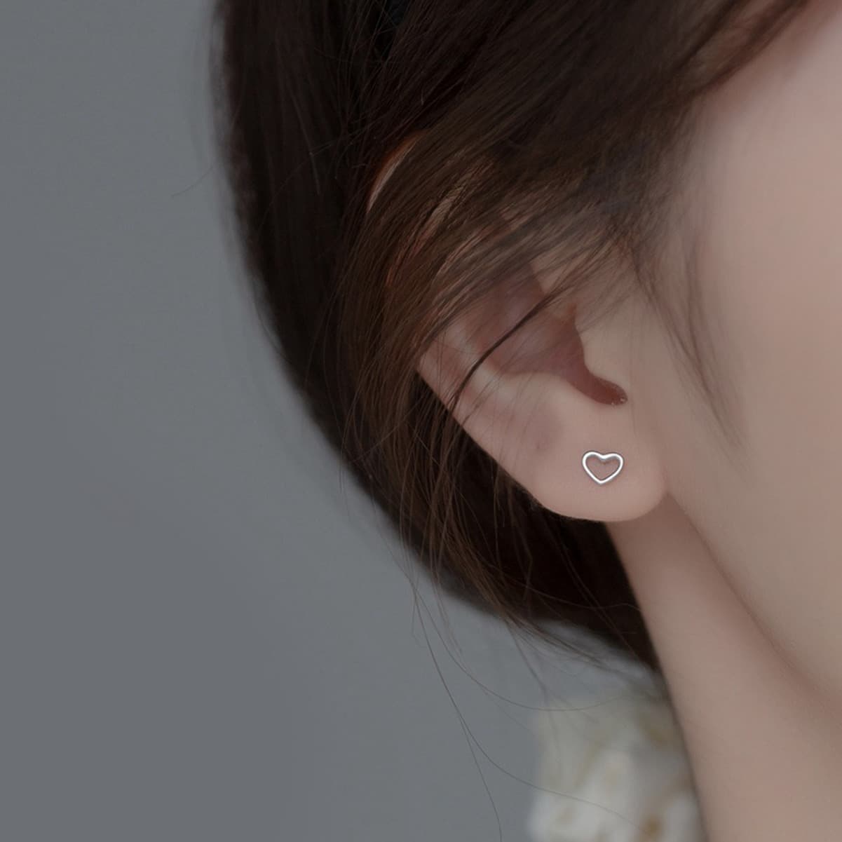 European and American hot-selling hollow love earrings, heart-shaped screws, ear bone nails, Hot Girls Hot Style 2024 New Earrings Wholesale 3