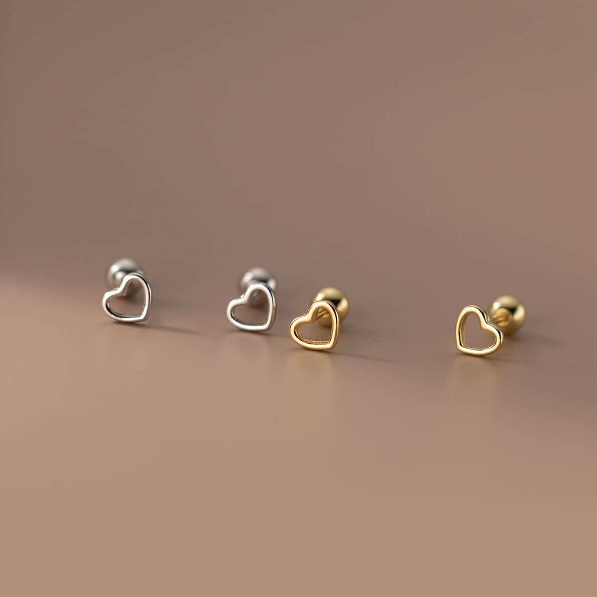 European and American hot-selling hollow love earrings, heart-shaped screws, ear bone nails, Hot Girls Hot Style 2024 New Earrings Wholesale 4