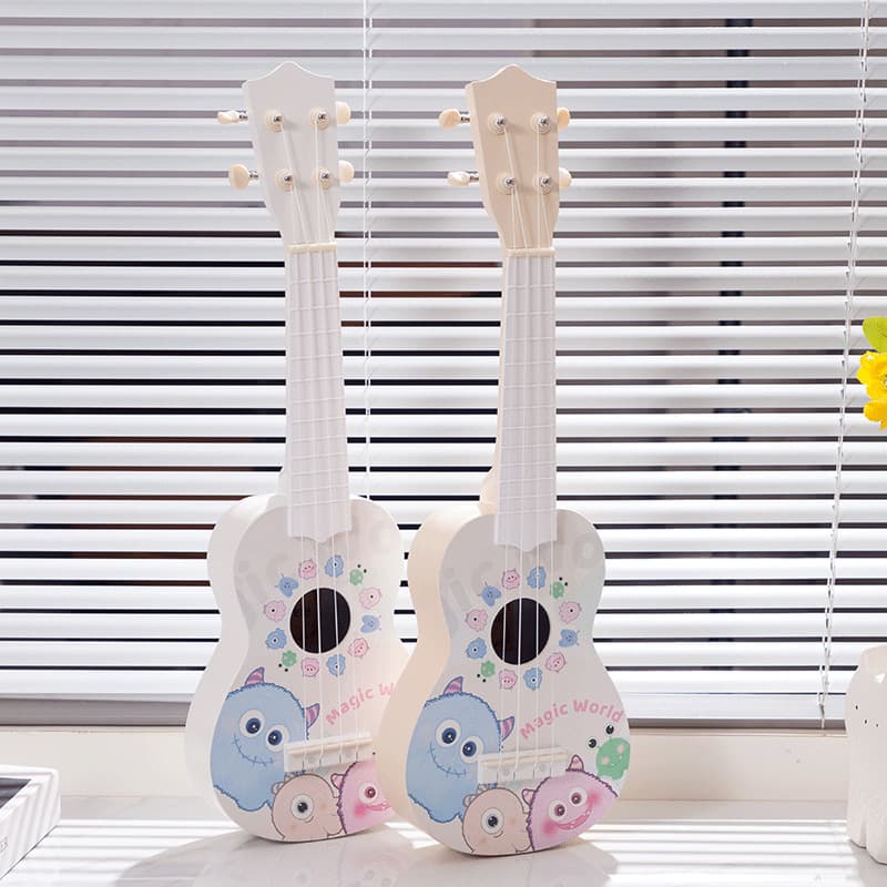 Ukulele beginner male and female students good-looking entry-level instrument self-taught small guitar cute little monster ins style 1