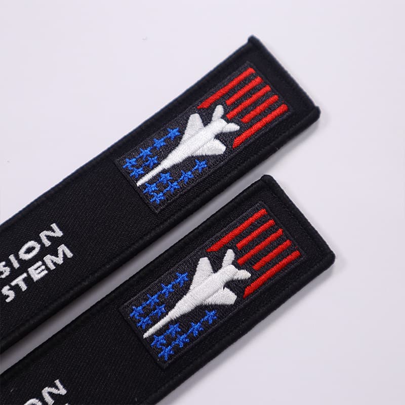 Customized fabric embroidered webbing tag key chain double-sided embroidery trendy pendant PU leather towel embroidered key chain 4