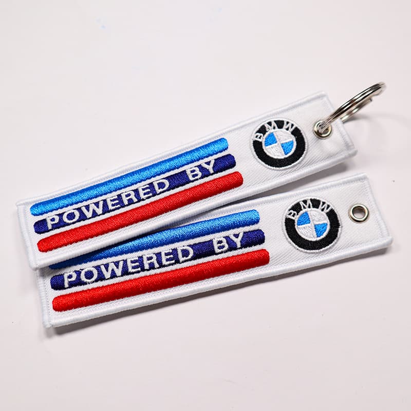Customized fabric embroidered webbing tag key chain double-sided embroidery trendy pendant PU leather towel embroidered key chain 5