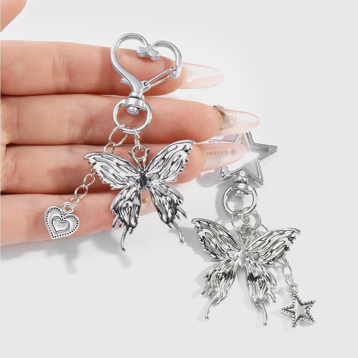 Cross-border hot style Y2K fashionable silver butterfly pink crystal star civet cat keychain earphone pendant 2