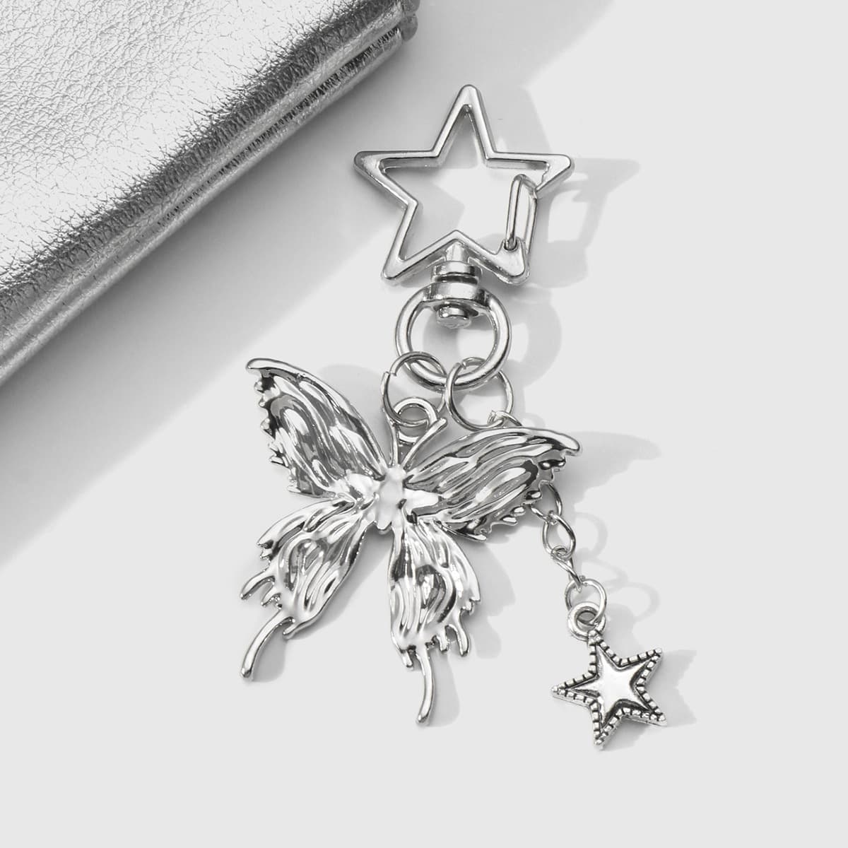 Cross-border hot style Y2K fashionable silver butterfly pink crystal star civet cat keychain earphone pendant 7