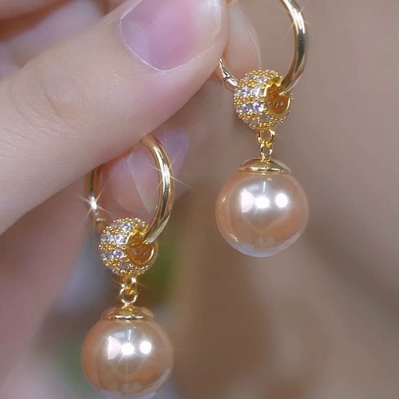 2024 autumn and winter new versatile champagne color pearl tassel earrings retro niche design internet celebrity hot style earrings 3