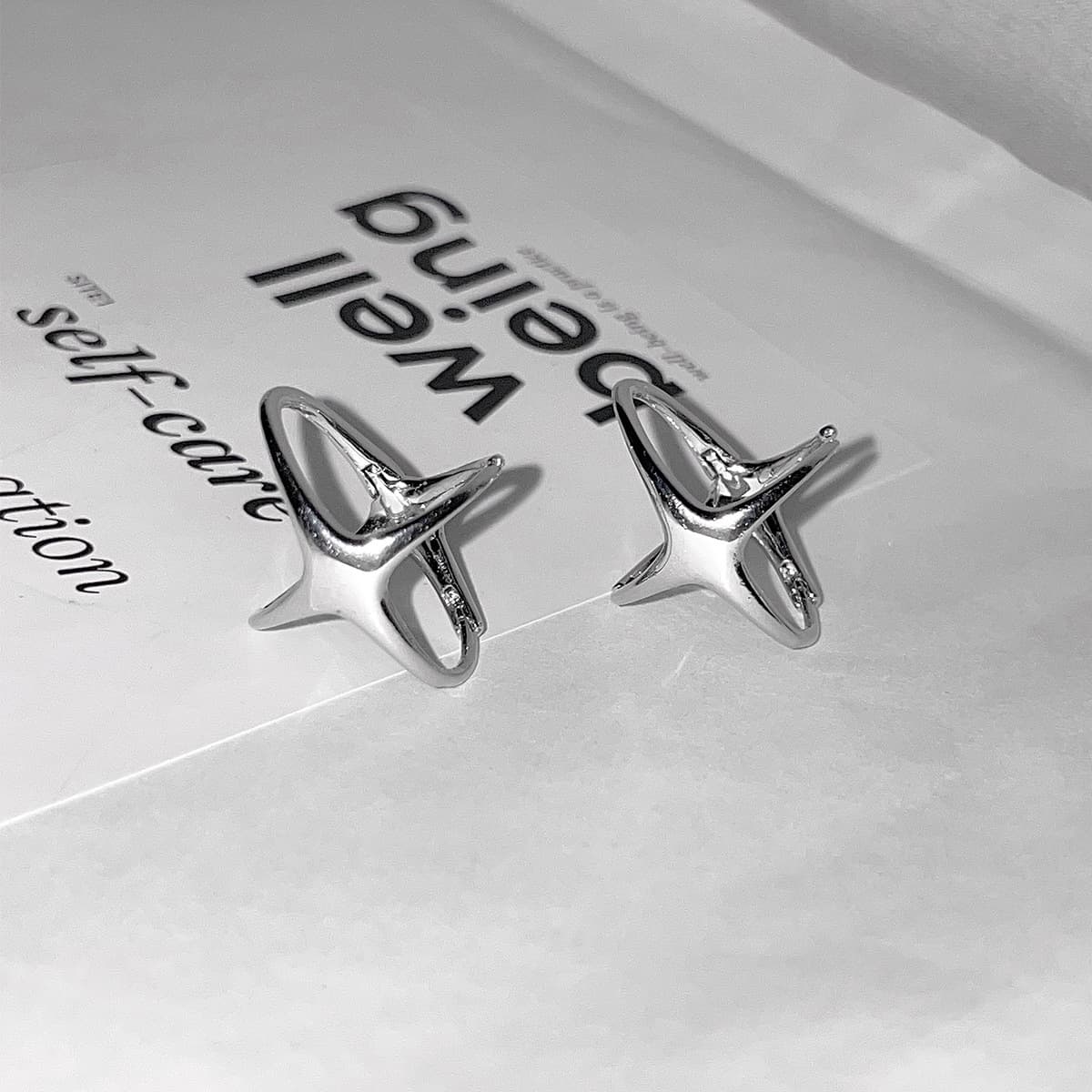 925 silver needle four-pointed star earrings for women Korean style simple niche design cold style exquisite earrings high-end earrings 3