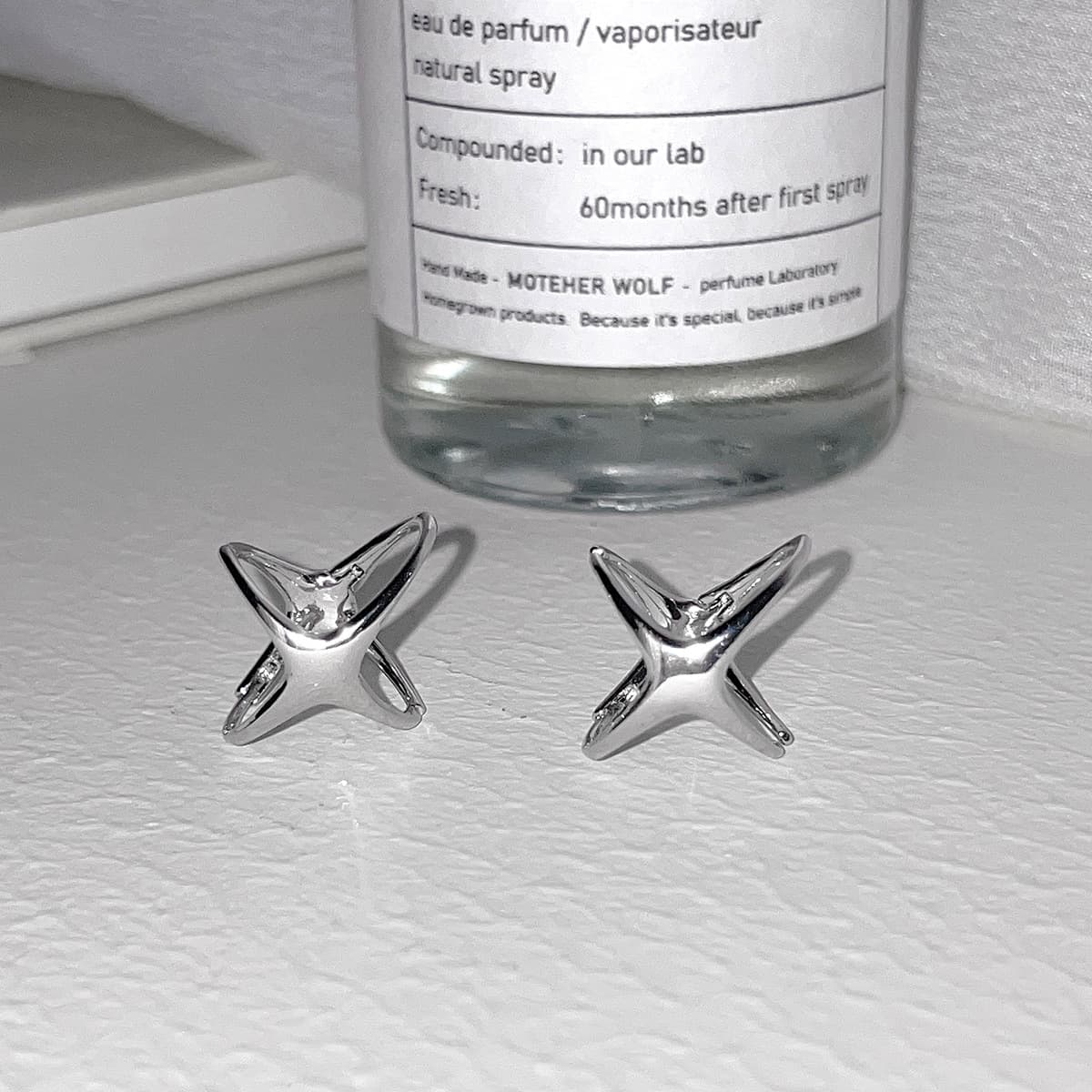 925 silver needle four-pointed star earrings for women Korean style simple niche design cold style exquisite earrings high-end earrings 7