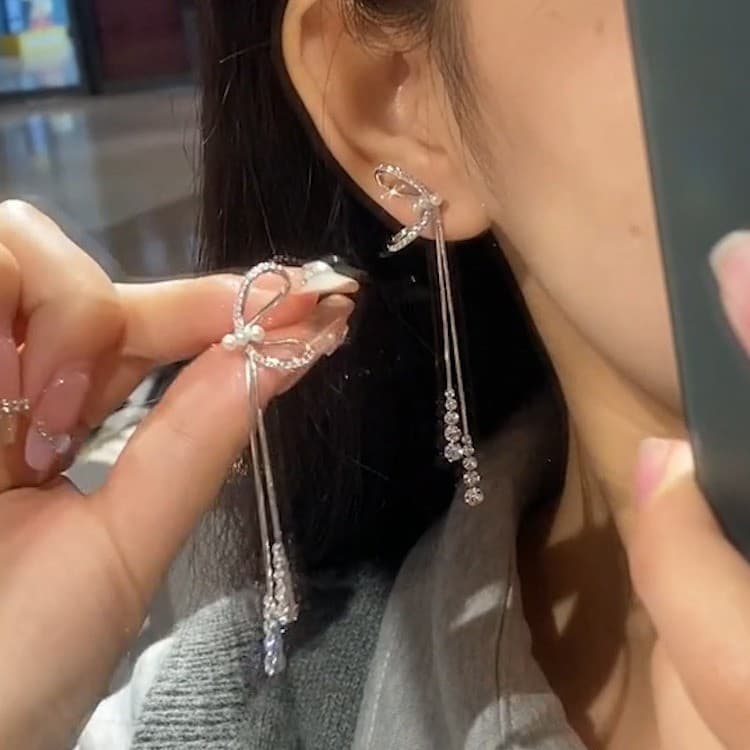 Super fairy bow pearl tassel earrings for women 2026 new popular niche design cold style long earrings 8