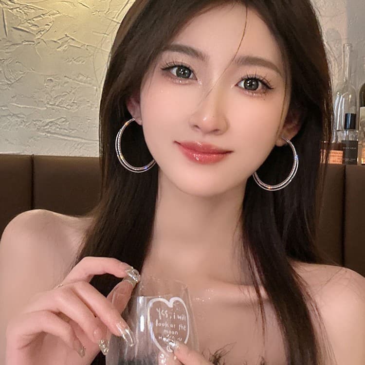 Exaggerated silver rotating earrings, popular earrings, twist large earrings, niche design, high-end, unique and beautiful earrings 4