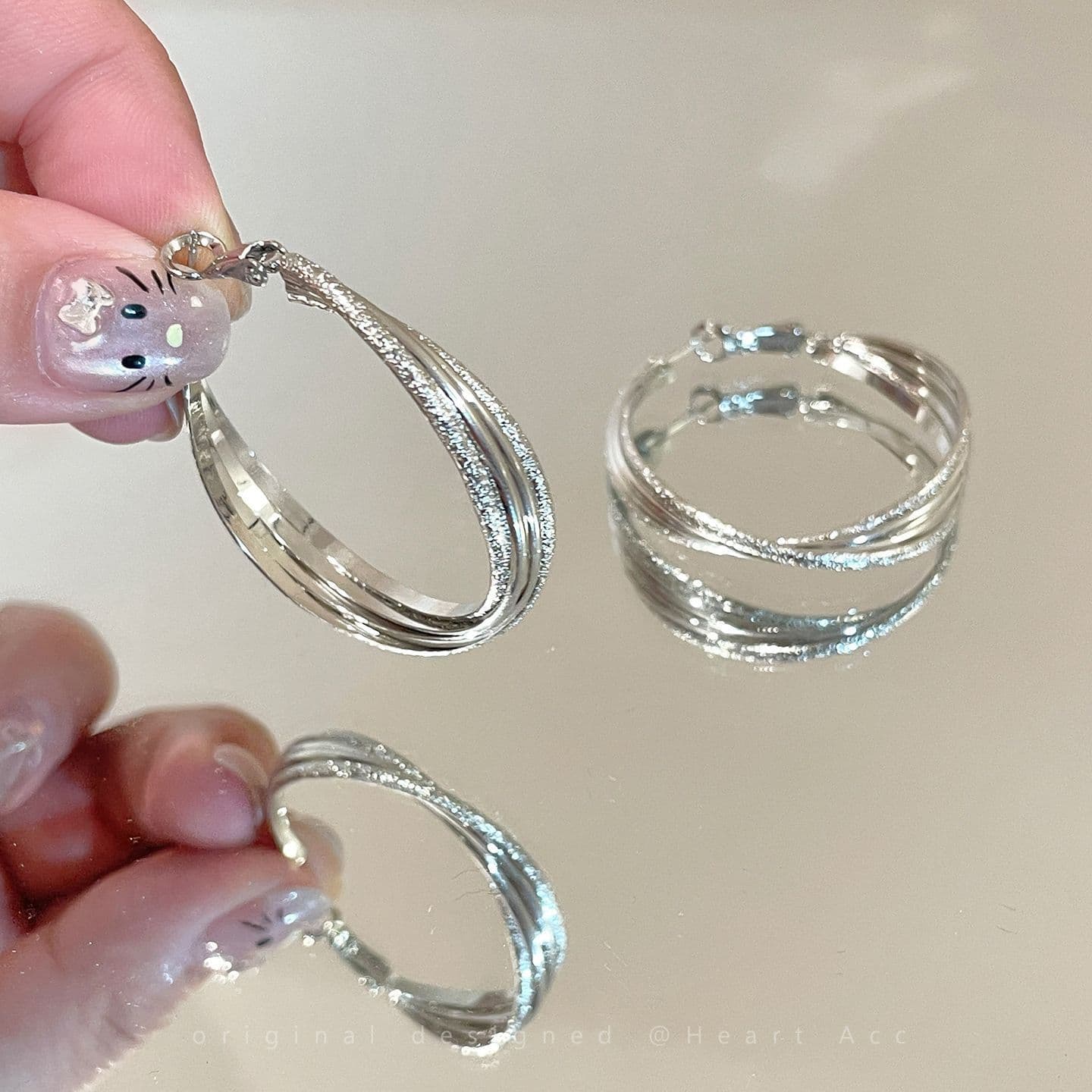 Exaggerated silver rotating earrings, popular earrings, twist large earrings, niche design, high-end, unique and beautiful earrings 9