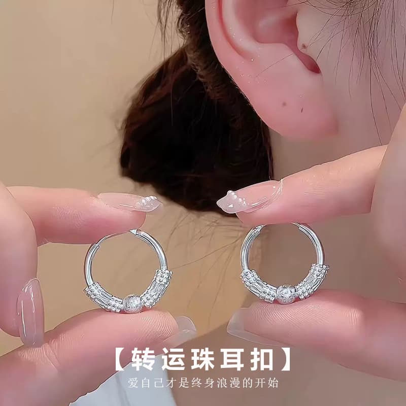 Fashionable and light luxury transfer bead earrings, feminine, versatile, exquisite hollow design, high-end niche daily earrings 2