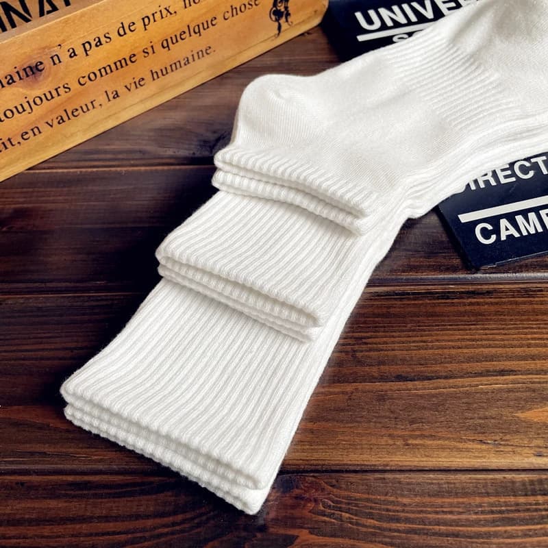 100% pure cotton Xinjiang cotton socks men's and women's sports socks black and white solid color autumn and winter four seasons student deodorant socks for couples 4