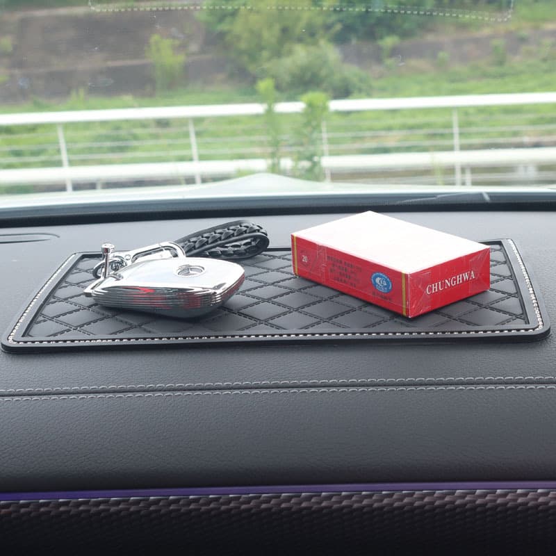 Car pearl crown feather mobile phone inlaid diamond anti -sliding pad creative car supplies mountain camellia female car decoration 3