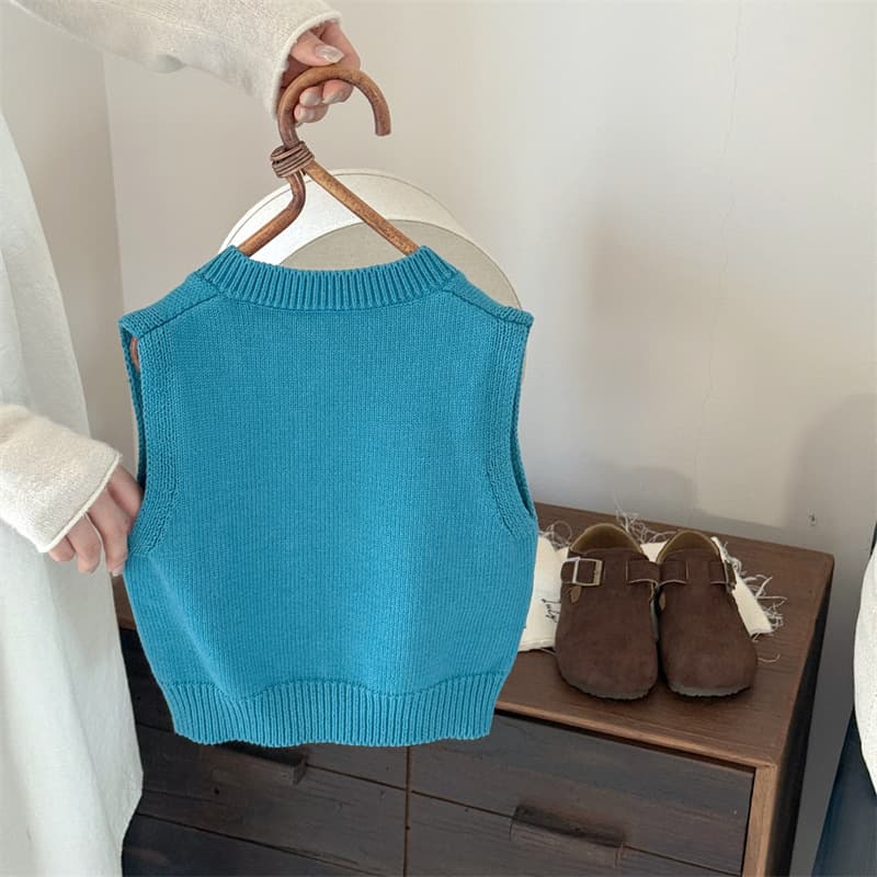 Demi-season keep warm knitted umbilical bandage for men and women, cartoon vest, children's sweater with a round collar 4