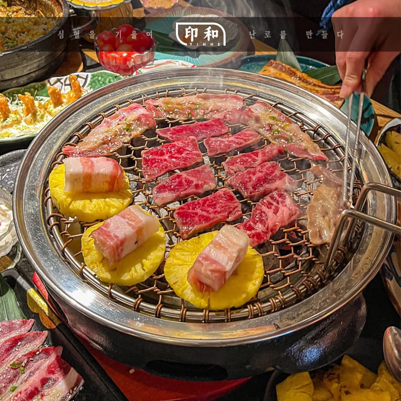 Korean cast iron barbecue stove Japanese smokeless barbecue stove Commercial round charcoal grill pot Household charcoal grill 4