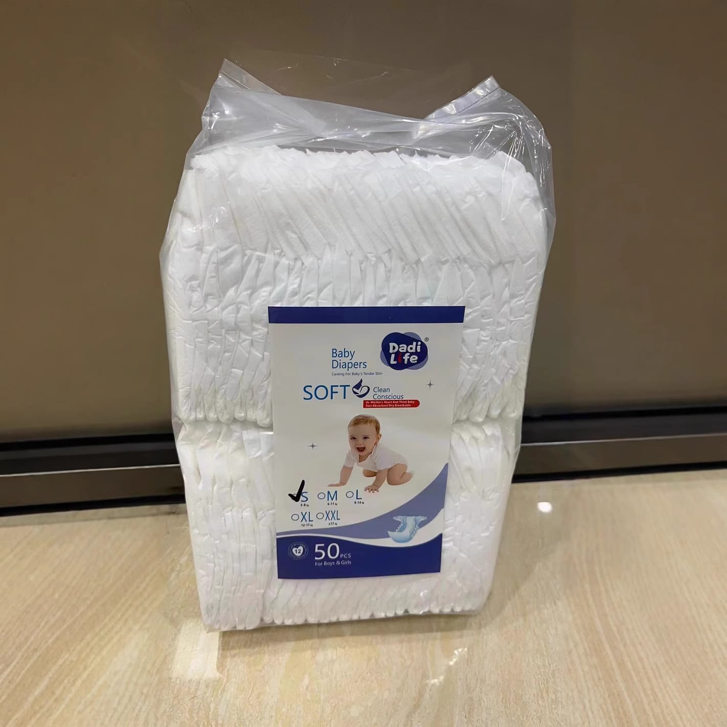 Manufacturer small size baby diapers NB code S code children's transparent bag packaging long-term wholesale export breathable thin 3