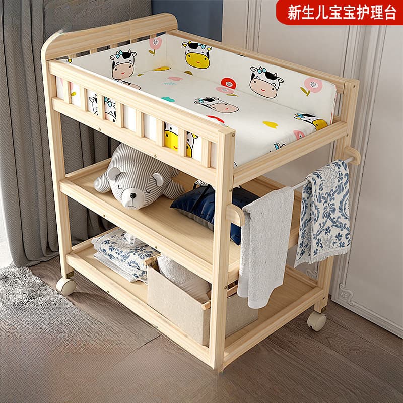 Diaper table from natural wood, universal children's massager 1
