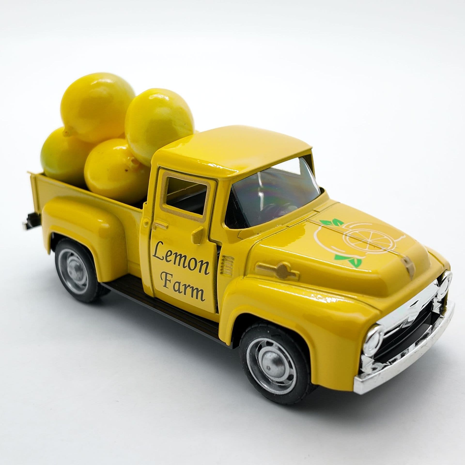 Small yellow metal retro truck 2