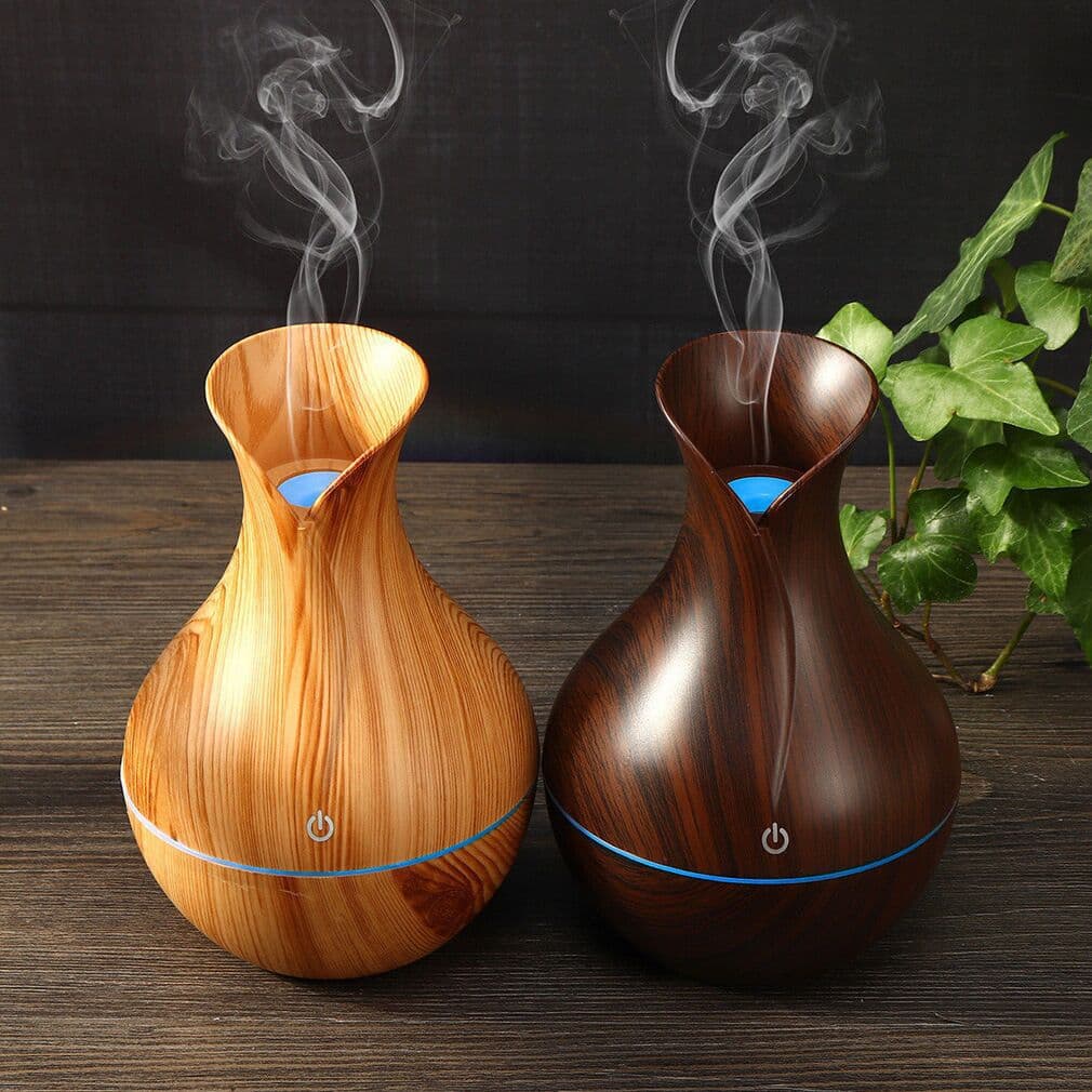 The factory cross-border specializes in usb mini colorful wood grain vase humidifier aromatherapy machine air purifier hydration device